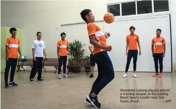  ??  ?? Shandong Luneng players attend a training session at the Luneng Brazil Sports Center near Sao Paulo, Brazil.