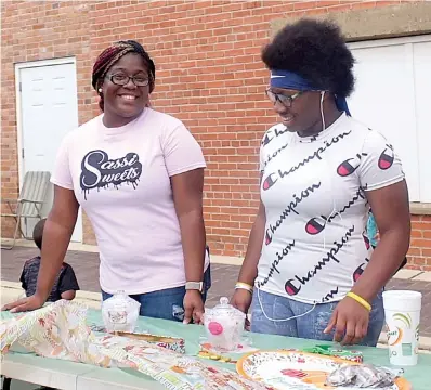  ??  ?? ■ ABOVE: Sara Stokes, left, and Alicia Harris of Sassi Sweets say they will make concoction­s for all your sweet needs.