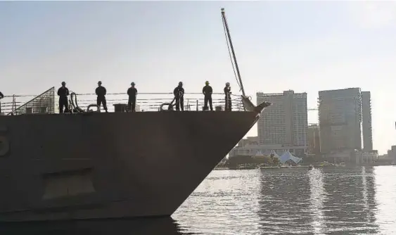  ??  ?? The Littoral Combat Ship Class (LCS) USS Milwaukee arrives in the Inner Harbor near the Baltimore Visitors Center on Wednesday morning. It is the fifth ship to be named for the city of Milwaukee. U.S., Canadian and British naval ships and U.S. Coast Guard vessels are here for Maryland Fleet Week and Air Show Baltimore.