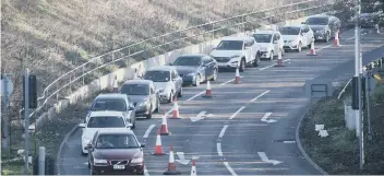  ??  ?? Traffic queuing near Rhubarb Bridge