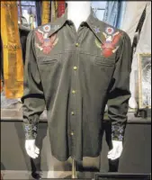  ??  ?? The Nudie Cohn-designed shirt that Johnny Cash wore to the 1976 American Bicentenni­al Grand Parade in D.C.