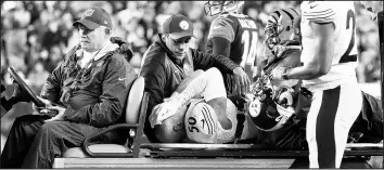  ?? FRANK VICTORES/AP ?? Shazier is carted off the field after suffering a spinal injury in 2017. He has not played since.