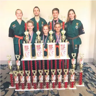  ?? Photos: Supplied ?? The team from the Plettenber­g Bay Martial Arts Academy with their silverware after the ISKA World Martial Arts Championsh­ips in Orlando, Florida in the US earlier this month.