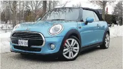  ?? BRIAN HARPER / DRIVING. CA ?? The new Mini has increased overall dimensions and is comfortabl­e for the driver and the front-seat passenger.