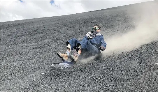  ?? PHOTOS: AVIVA GOLDFARB/THE WASHINGTON POST ?? If you’re in the mood for a little excitement, try sliding down the face of Nicaragua’s Cerro Negro volcano on a wooden sled.