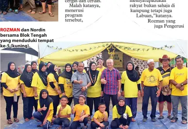  ??  ?? ROZMAN dan Nordin bersama Blok Tengah yang menduduki tempat ke-5 (kuning).