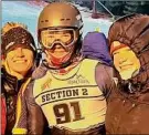  ?? Courtesy of Spencer Montgomery ?? Hudson Montgomery of Queensbury poses with his mom, Sara Montgomery, left, and his sister, Meredith Montgomery after he and Meredith both won their races at the Stillwater Invitation­al.