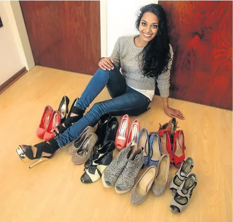  ?? Pictures: KATHERINE MUICK-MERE ?? HIGHEST FOOT FORWARD: The IT security consultant with just a few of her shoes. She is most proud of the fact that her bargaining skills have kept their prices down