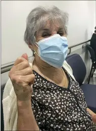  ?? PHOTO PROVIDED BY SUSAN CARABALLOI­N ?? Noemi Caraballo reacts after getting her first COVID-19 vaccine shot on Jan 26, in Miami.