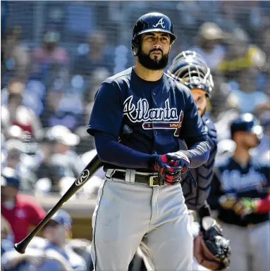  ?? DENIS POROY / GETTY IMAGES ?? The Braves’ Nick Markakis reacts to a strike in the eighth inning of Wednesday’s game against the San Diego Padres. The Padres clinched the series with a 3-1 win, the 16th Braves defeat at Petco Park in the past 19 games.