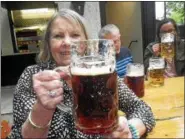  ?? SUBMITTED ?? Podolak raises a glass of beer to toast Munich.