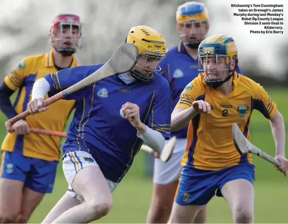  ??  ?? Kilshannig’s Tom Cunningham takes on Grenagh’s James Murphy during last Monday’s Rebel Óg County League Division 3 semi-final in Kildorrery. Photo by Eric Barry