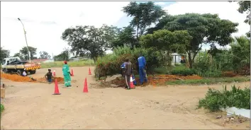  ??  ?? Africom men at work in the trenches laying the LTE fibre