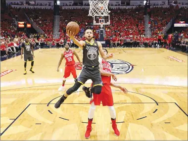  ??  ?? Golden State’s Stephen Curry takes a shot during a May 6 game against the New Orleans Pelicans at the Smoothie King Center in New Orleans, LA.