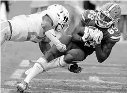  ?? JOHN RAOUX/AP South Carolina at UF ?? Tyrie Cleveland catches the winning 63-yard TD pass vs. Tennessee on Sept. 16, 2017. Noon Saturday, ESPN