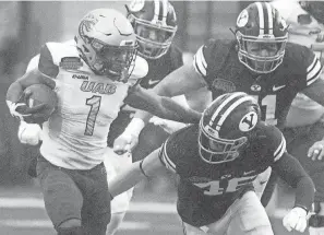  ?? HENRIETTA WILDSMITH/SHREVEPORT TIMES ?? UAB'S Jermaine Brown Jr. scores a touchdown against BYU during the Independen­ce Bowl on Saturday.