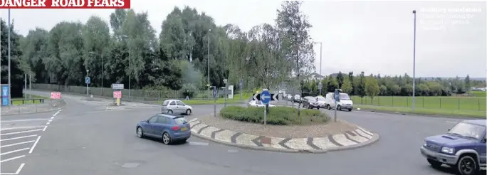  ??  ?? Heathery roundabout Pupils face crossing the busy road to get to St Thomas PS