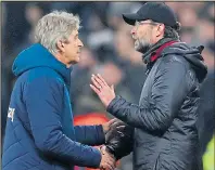  ??  ?? BATTLE: Klopp with Hammers boss Manuel Pellegrini