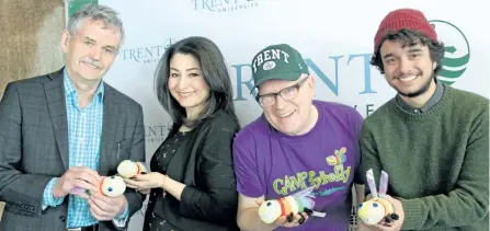  ?? JOELLE KOVACH/EXAMINER ?? Trent University is about to have a new, national camp this summer for LGBTQ youth. Camp Fyerfly Ontario will be held on campus at Trent in July. The camp was launched Friday at Trent. From left, Trent president Leo Groarke, Kawartha-Peterborou­gh MP...