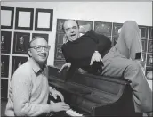  ?? THE ASSOCIATED PRESS ?? Playwright Neil Simon, left, and actor James Coco pose for a photo in New York during the New York announceme­nt of a Broadway-bound musical comedy, “Little Me.”