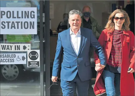  ?? Picture: PA ?? Labour leader Sir Keir Starmer and wife Victoria cast their votes in north London on Thursday