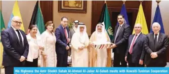  ??  ?? His Highness the Amir Sheikh Sabah Al-Ahmad Al-Jaber Al-Sabah meets with Kuwaiti-Tunisian Cooperatio­n Council Chairman Fahad Abdelrahma­n Al-Mojil and council members.