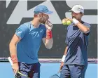  ?? AP ?? Michael Venus, left, talks with partner Raven Klaasen during their doubles loss yesterday.