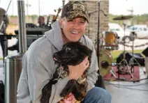  ??  ?? Dave Sharpe (with Darby) also helps first responders and military families.