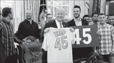  ?? OLIVIER DOULIERY/TRIBUNE NEWS SERVICE ?? U.S President Donald Trump meets with the Chicago Cubs in the Oval Office of the White House on Wednesday in Washington, D.C.