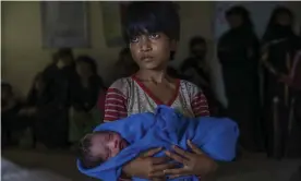  ??  ?? About 80% of those fleeing are women and children – and there are babies being born along the way. Photograph: Dar Yasin/AP
