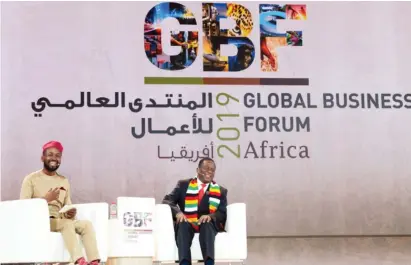  ??  ?? President Mnangagwa shares a lighter moment with Sangu Delle, chairman of Golden Palm Investment­s, at the Global Business Forum on Africa in Dubai on Monday