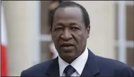  ?? (AP/Francois Mori) ?? Burkina Faso President Blaise Compaore speaks to the media after a meeting with France’s President Francois Hollande at the Elysee Palace in Paris on Sept. 18, 2012.