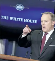  ?? AARON P. BERNSTEIN/GETTY IMAGES ?? White House Press Secretary Sean Spicer holds the daily briefing Thursday at the White House in Washington, D.C. Spicer laughed off a question from an NBC News reporter who asked about a wall with Canada.