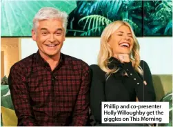  ??  ?? Phillip and co-presenter
Holly Willoughby get the giggles on This Morning