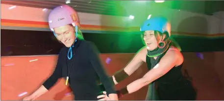  ??  ?? Roisin Roberts and Ceola McGowan at the 80’ s Roller Disco in Zero Gravity Skatepark, last Saturday evening.