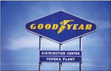  ?? EVERT NELSON — THE TOPEKA CAPITAL-JOURNAL VIA AP ?? In this Aug. 20, 2020file photo, signage for the Goodyear Distributi­on Center stands in Topeka, Kan. Goodyear Tire and Rubber Co. is acquiring Cooper tires in a deal valued at $2.5billion that will combine the two century-old Ohio companies.