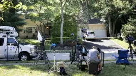  ?? ?? News media set up in front of the home of U.S. District Judge Esther Salas on July 20 in North Brunswick, N.J. Judge Salas’ son was shot to death and her husband wounded by a man who was disgruntle­d with her.