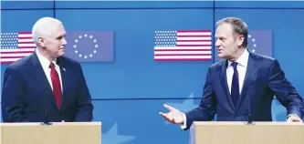  ?? (Reuters) ?? US VICE PRESIDENT Mike Pence (left) and European Council President Donald Tusk hold a joint press conference in Brussels yesterday.