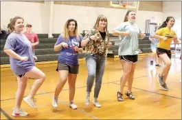  ??  ?? The video game, “Let’s Dance” was one of the stations at Prairie Grove Middle School Fitness Fair.