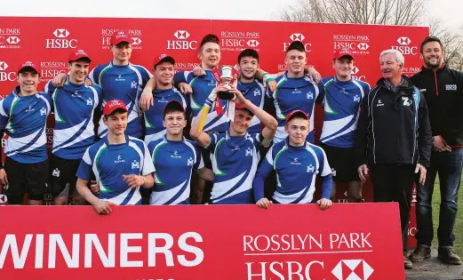  ??  ?? Thirty nine years on: Coach Alan Reid, second right back row, returns to the podium with the U16 team that won Rosslyn Park in 2015