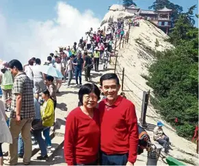  ??  ?? Dr Chong and his wife used to travel several times a year but travelling is a lot more challengin­g now that Liew has dementia.