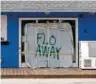  ?? GETTY IMAGES ?? A Topsail Island, N.C., bar sits empty with a simple message on its door.