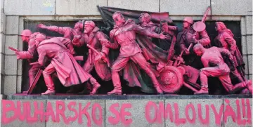  ??  ?? A SOVIET ARMY monument in Eastern Europe is painted pink.