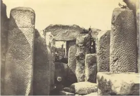  ?? ?? Ħaġar Qim photograph­ed in 1841 showing the pitted decoration­s now eroded away.
