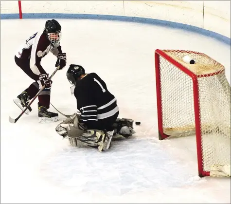  ?? Photos by Ernest A. Brown ?? Mt/ Hope senior goalie Kyle Depoy (above, saving a shot from Joe Roy) made 39 saves, while forward Ryan Cordeiro (bottom, center) scored a goal to lead the Huskies to a 2-1 win over No. 2 Woonsocket in the Division III semifinals. Novan goalie Devon...