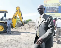  ?? RICARDO MAKYN/CHIEF PHOTO EDITOR ?? Minister of Local Government and Community Developmen­t Desmond McKenzie walks away after the groundbrea­king ceremony for the constructi­on of an adult transition­al facility on King Street on Monday. The facility, which will be a one-of-a-kind in Jamaica, was the brainchild of the former mayor and will be built on property owned by the Kingston and St Andrew Municipal Corporatio­n.