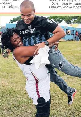  ?? CONTRIBUTE­D ?? Carlo Redwood, VP marketing at FLOW, is lifted by an ecstatic football fan during Saturday’s edition of the Flow Ball & Blaze Tour in Spanish Town, St Catherine. The telecommun­ications firm stopped at Eltham High School for the second in its series of...