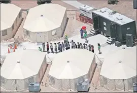  ?? Joe Raedle Getty Images ?? ABOUT 3,200 migrant teens have come through the Tornillo shelter since it opened in June, a Health and Human Services official said. “This is a last stop.”