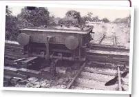  ??  ?? The modified tender frames used as a crane test weigh carrier are being extracted from a disconnect­ed siding on the Swindon & Cricklade Railway. Note the wagon buffers and drawhook fitted to the locomotive end.