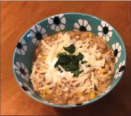  ?? NICOLE HVIDSTEN — MINNEAPOLI­S STAR TRIBUNE ?? White chicken chili as a southweste­rn flair. The addition of chiles and corn give this warming chili a little Tex-Mex flair. Adapted from the Food Network by Nicole Hvidsten.